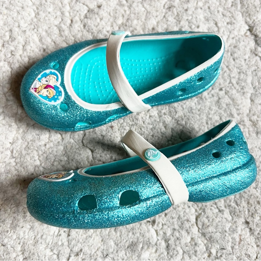Crocs: Frozen Elsa and Anna Blue Glitter with White Trim Slip On Keeley Flats